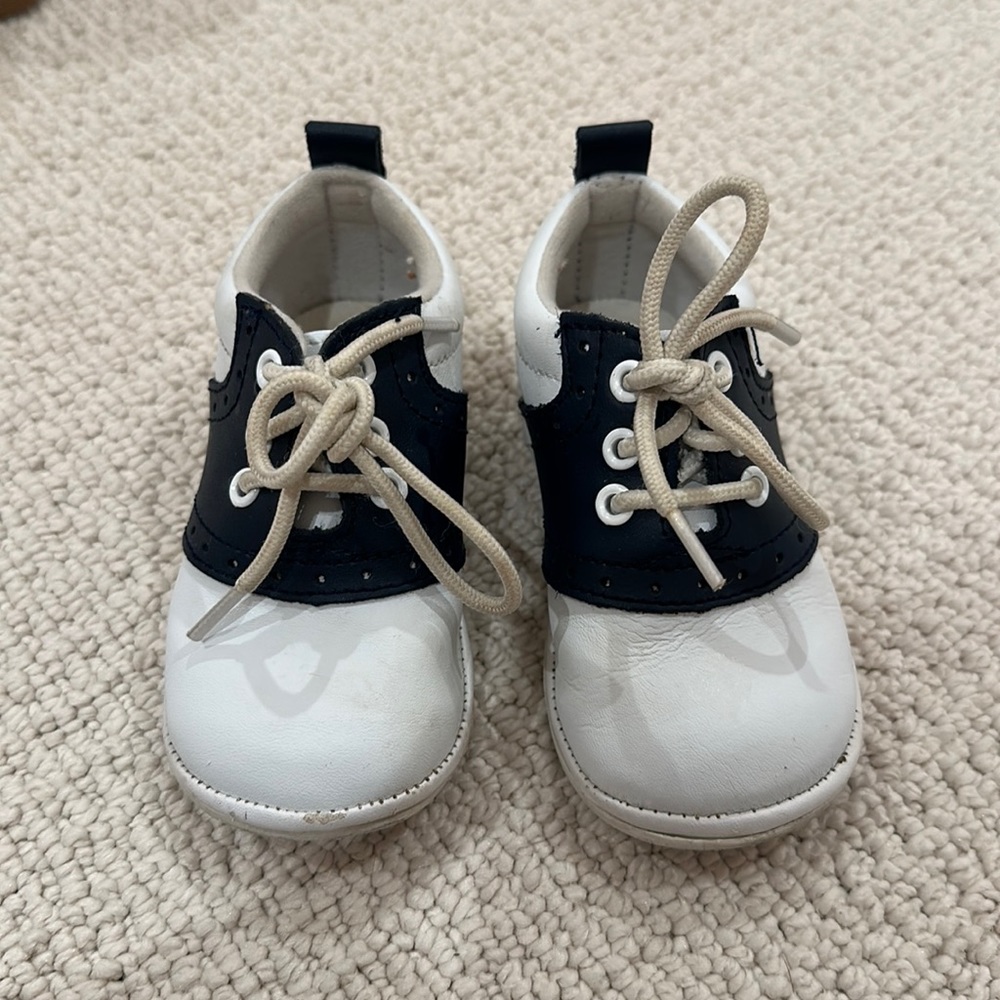White and navy baby Saddle Oxford shoes